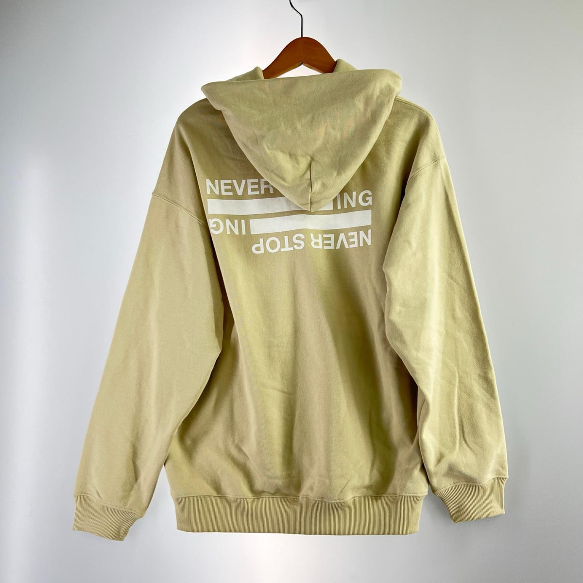 パーカー THE NORTH FACE NEVER STOP ING Hoodie NT12443 ﾍﾞｰｼﾞｭ (L) S ベージュ