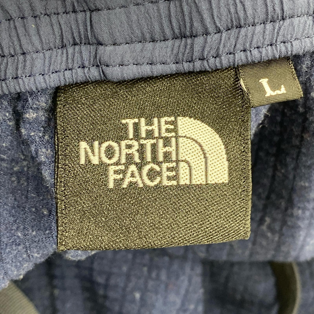 パンツ NB81874 バーサグリッド ネイビー L