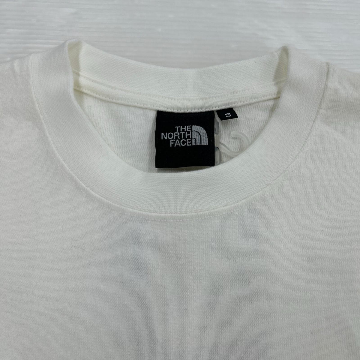 長袖Ｔシャツ THE NORTH FACE 　L/S 30th Nuptse Tee NT82235 白 (S) S ホワイト