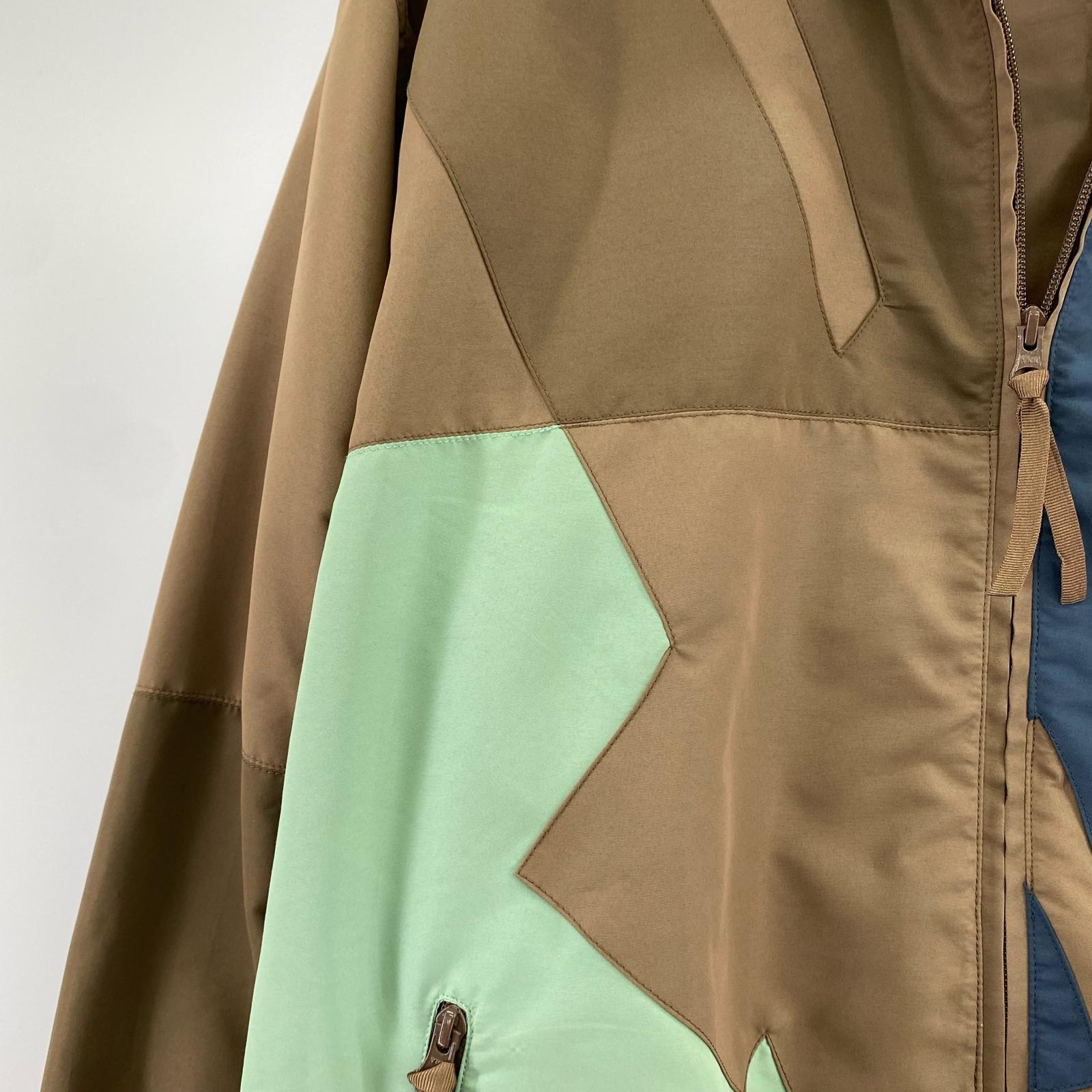 ジャケット UNDEFEATED Patchwork Icon Jacket (XL) ブラウン×マルチカラー LL
