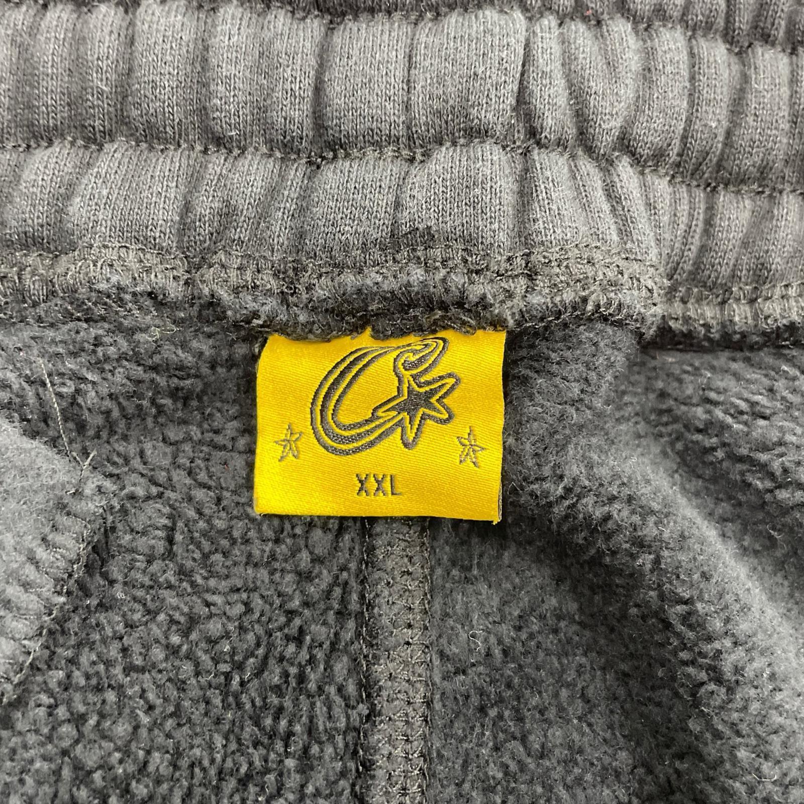 パンツ Corteiz ｱｲﾗﾝﾄﾞﾊﾟﾌﾌﾟﾘﾝﾄｽｳｪｯﾄﾊﾟﾝﾂ 黒 (XXL) ブラック