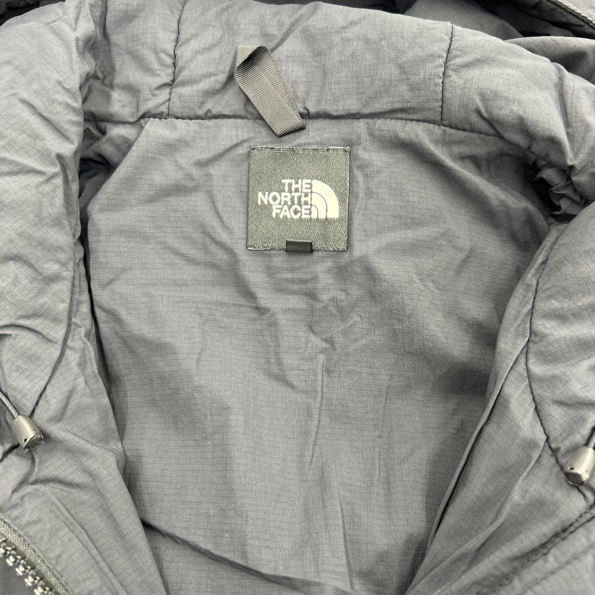 ジャケット 中綿ジャケット トランゴパーカ BLK L L ブラック