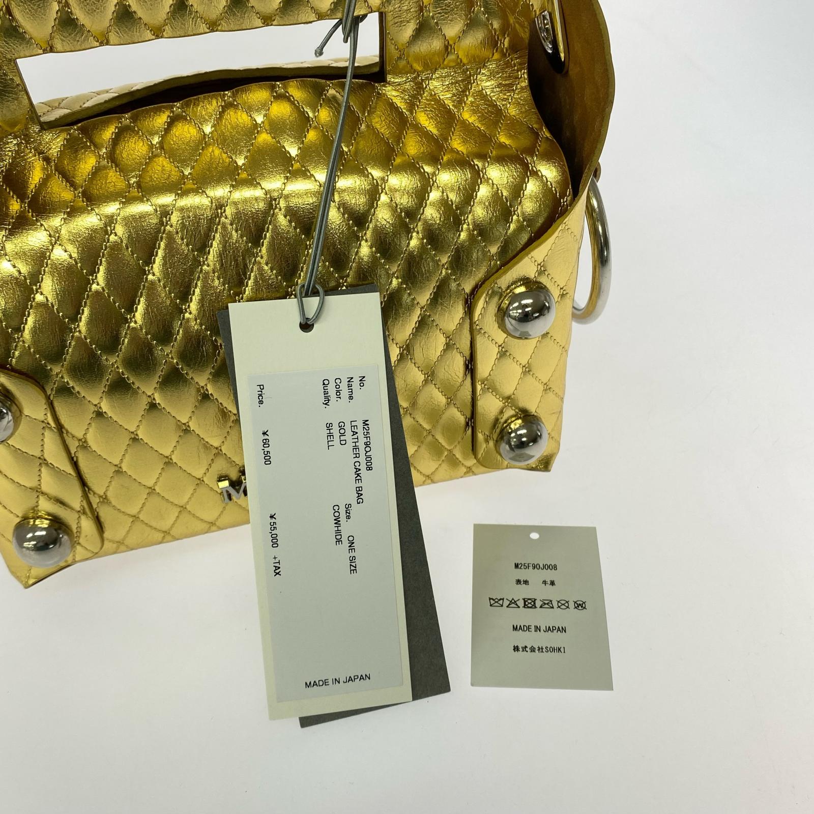 その他バッグ LEATHER CAKE BAG GOLD ゴールド