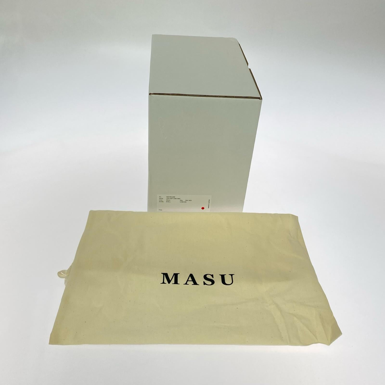 その他バッグ LEATHER CAKE BAG GOLD ゴールド