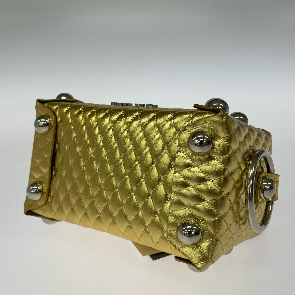 その他バッグ LEATHER CAKE BAG GOLD ゴールド