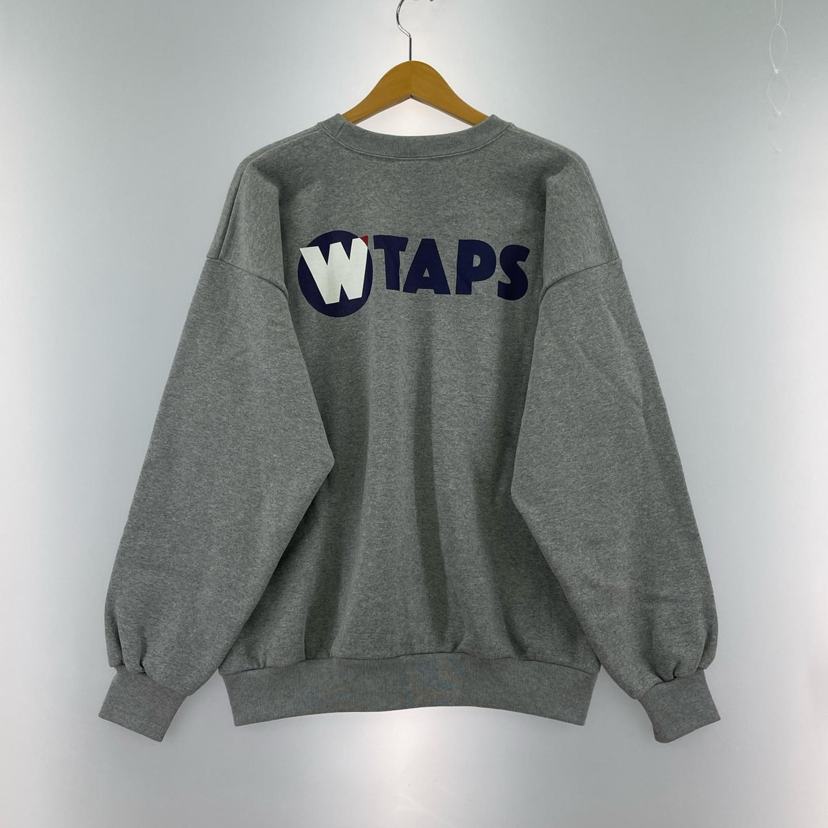 スウェット TNNL SWEATER グレー
