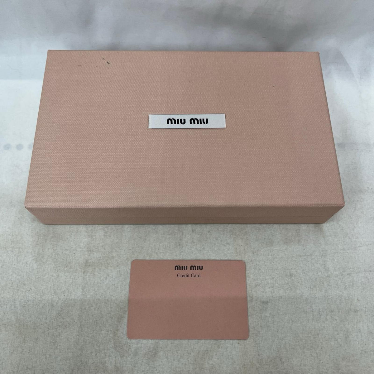 MIU MIU マテラッセ ラウンドジップウォレット 茶