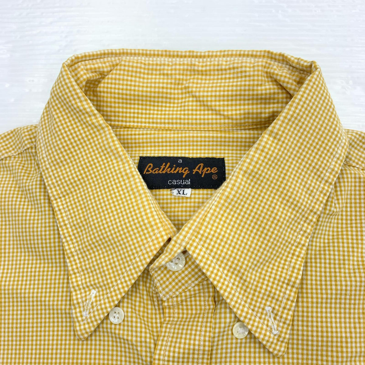 長袖シャツ A BATHING APE ｷﾞﾝｶﾞﾑﾁｪｯｸ S/Sｼｬﾂ 黄 (XL) イエロー