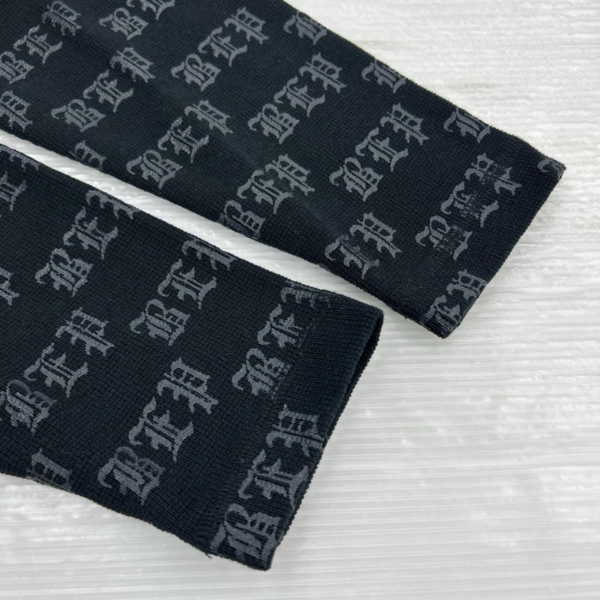 長袖Ｔシャツ ｻｰﾏﾙﾛﾝT　総柄　S S ブラック