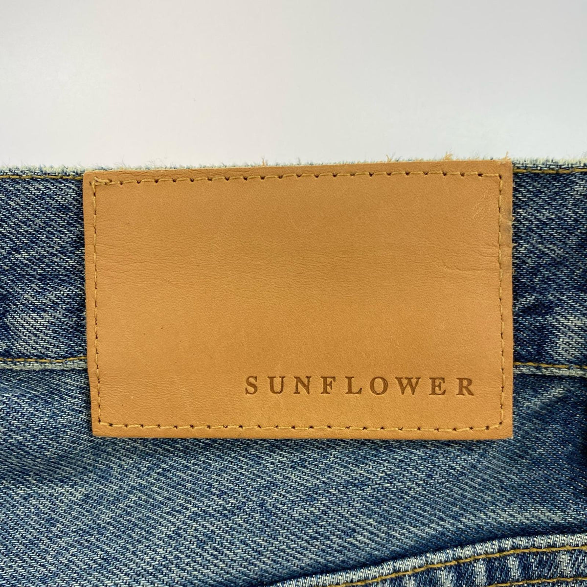 デニムパンツ SUNFLOWER LOOSE MID BLUE 33/32