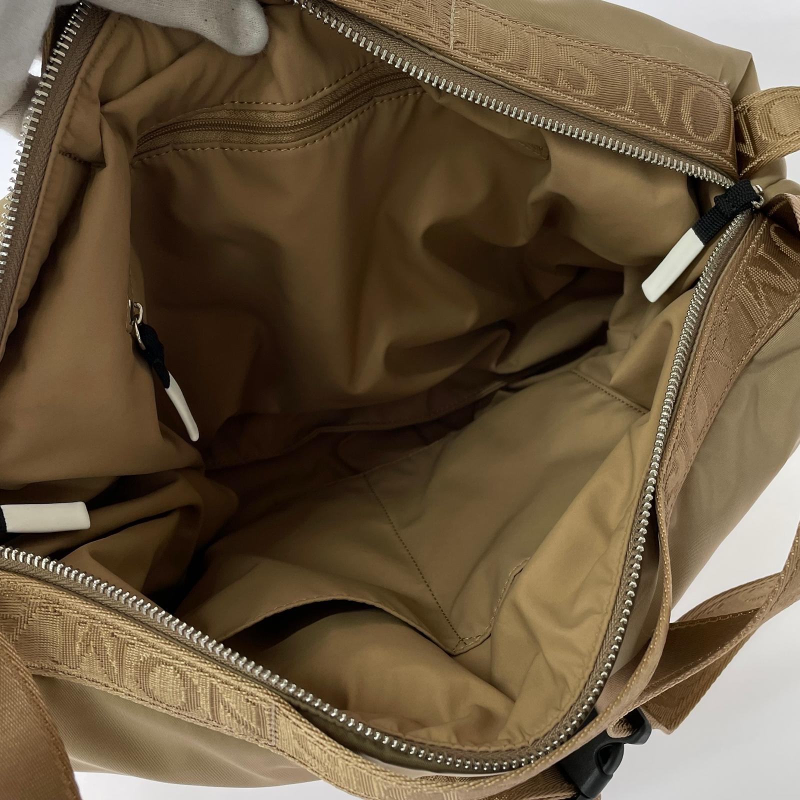 ショルダーバッグ NOMADIS バッグ ブラウン