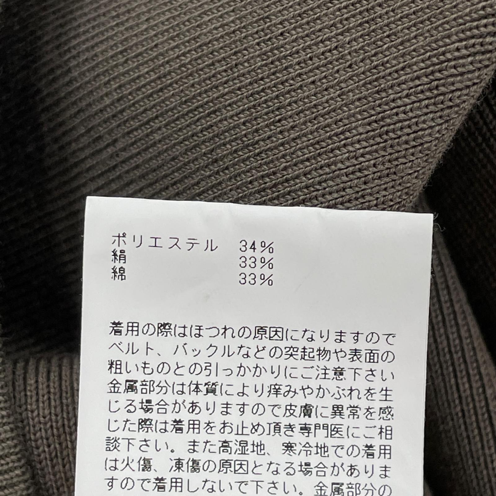 ニット アシンメトリーセータートップ OLV ベージュ