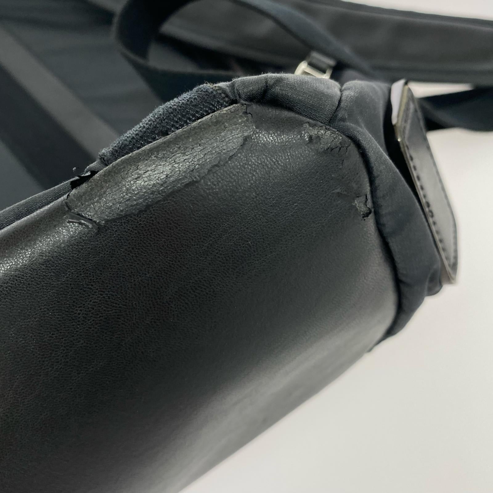 リュック・デイパック TUMI レザー×ナイロン バックパック 黒 ブラック