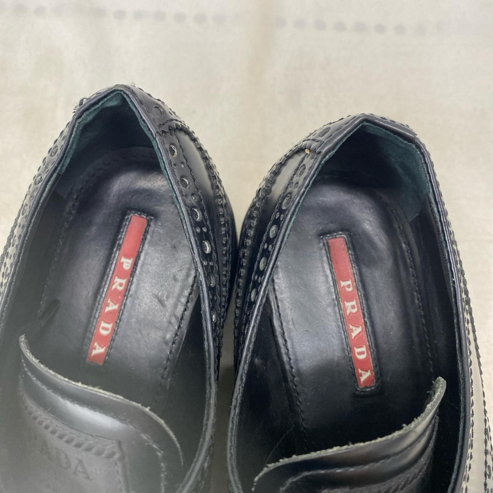 PRADA ｳｲﾝｸﾞﾁｯﾌﾟﾚｻﾞｰｼｭｰｽﾞ 黒 (37.5)