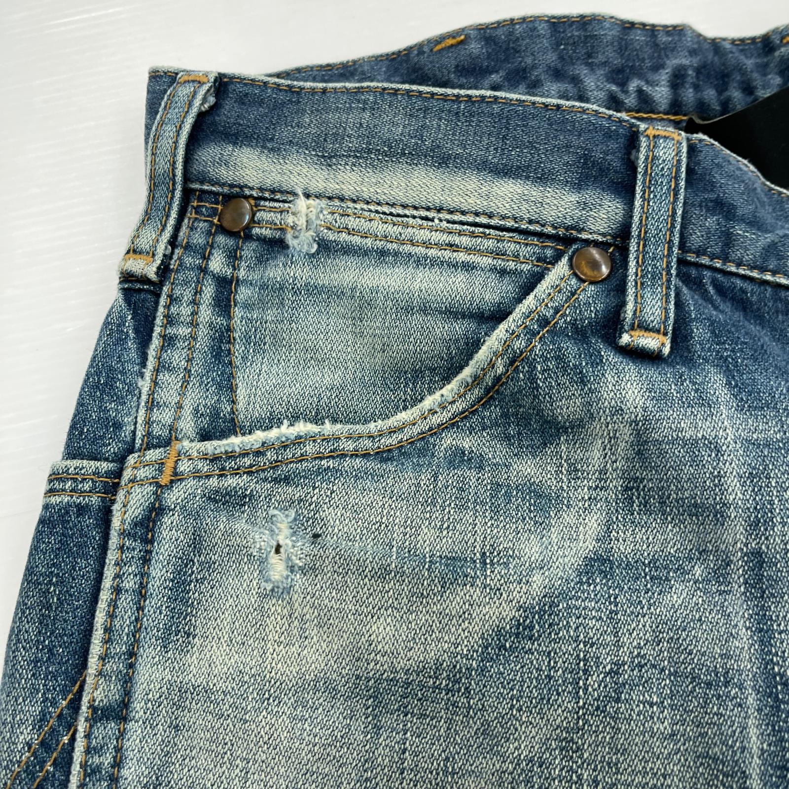デニムパンツ × Wrangler フレア リペア S