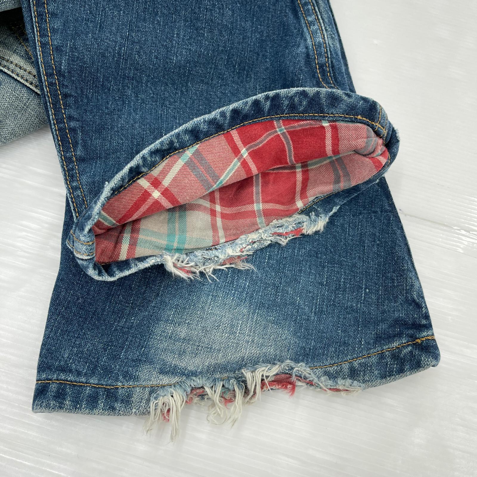 デニムパンツ × Wrangler フレア リペア S