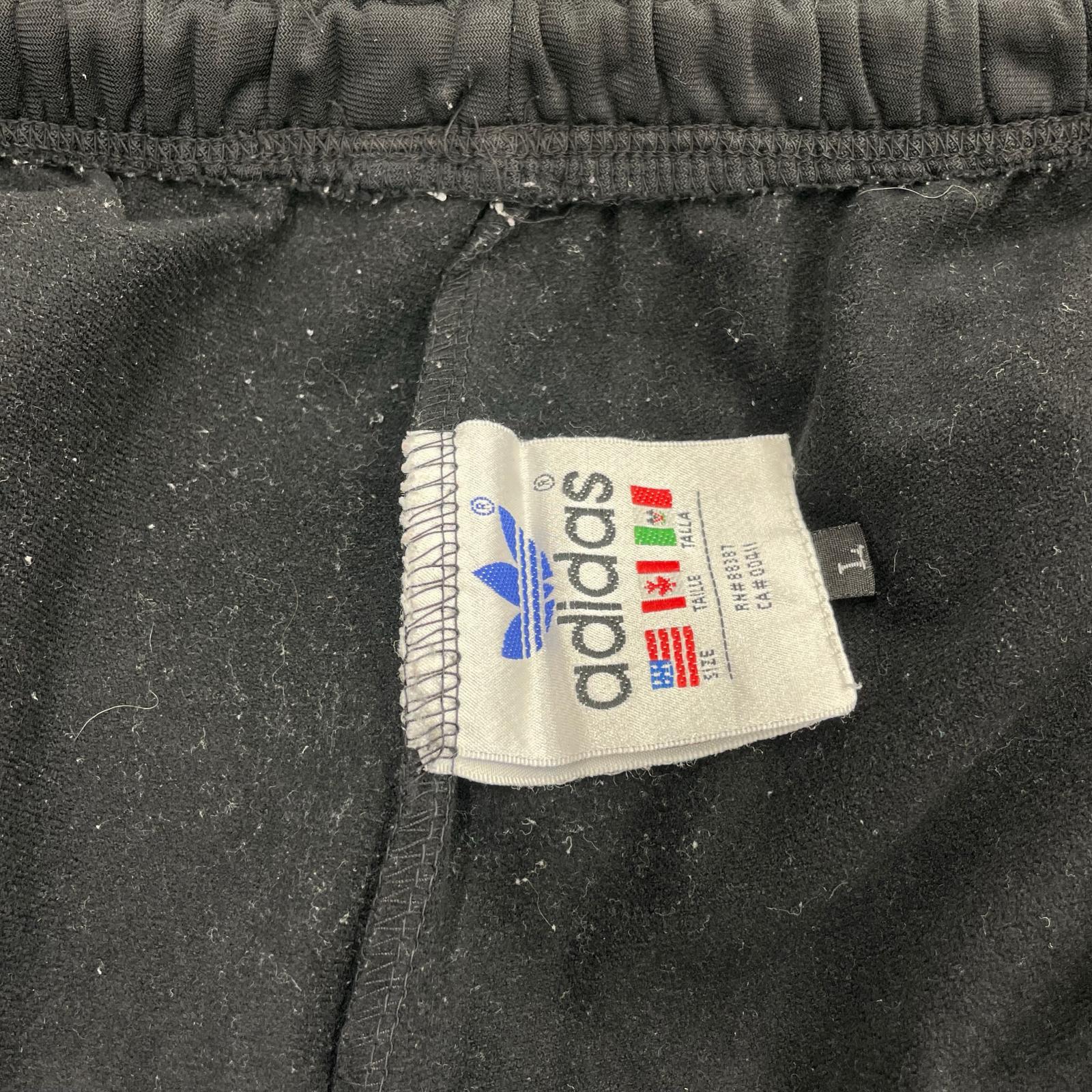 パンツ 80-90s トレフォイル 万国旗タグ トラックパンツ BLK L L ブラック