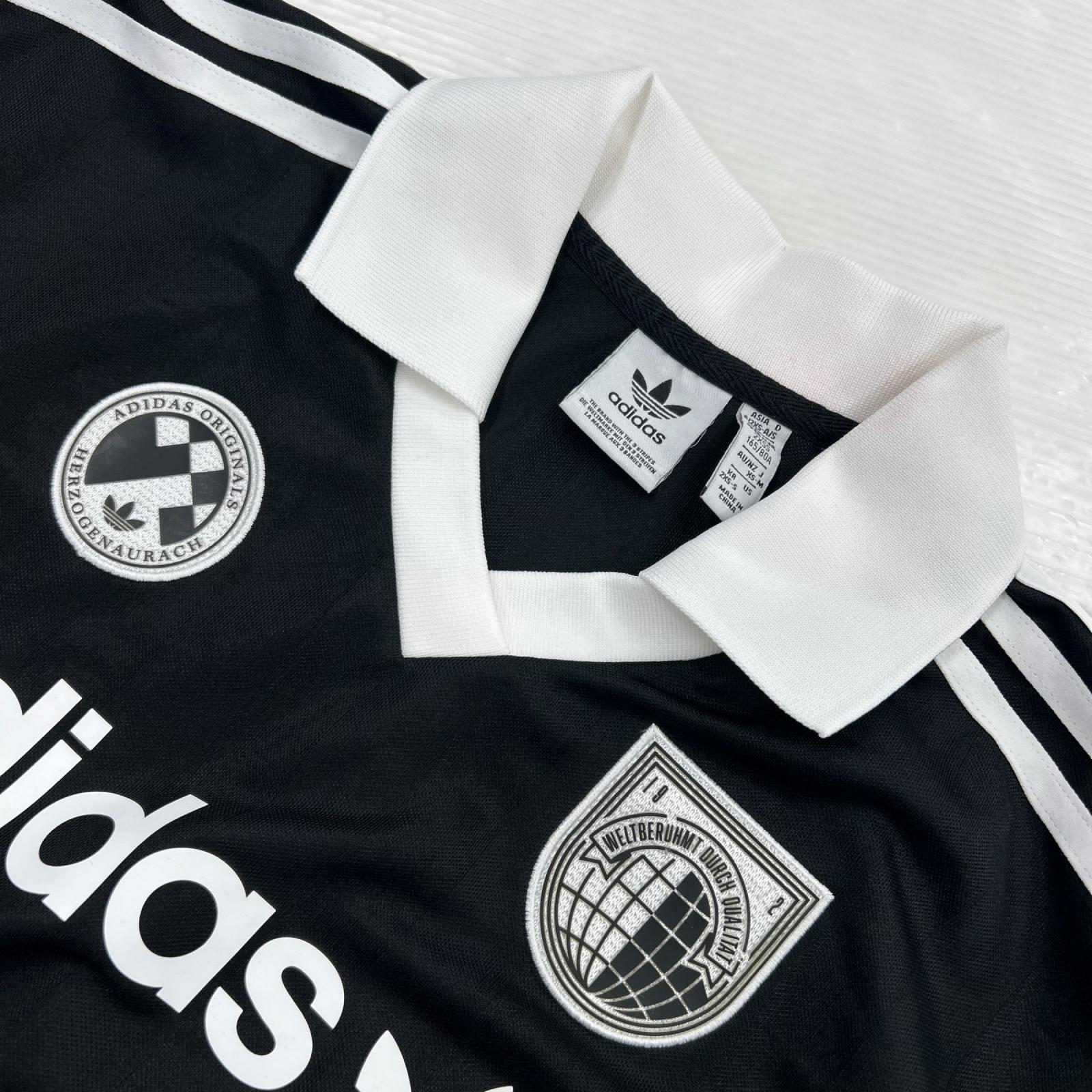 長袖Ｔシャツ FOOTBALL LONG T ﾌﾞﾗｯｸ (XS-M) ブラック