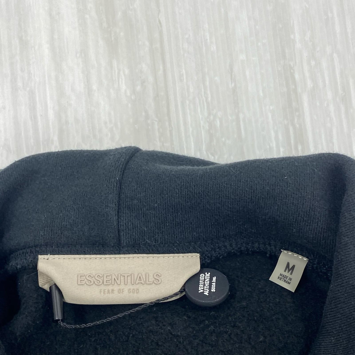パーカー ESSENTIALS FEAR OF GOD ﾌﾛｯｷｰﾌﾟﾘﾝﾄｽｳｪｯﾄ S ブラック