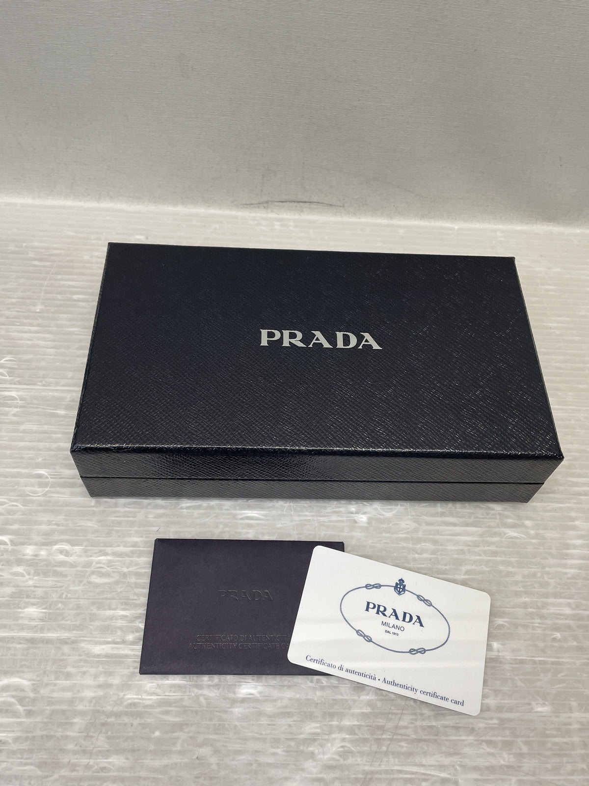 PRADA サフィアーノレザー フラップロングウォレット ベージュ
