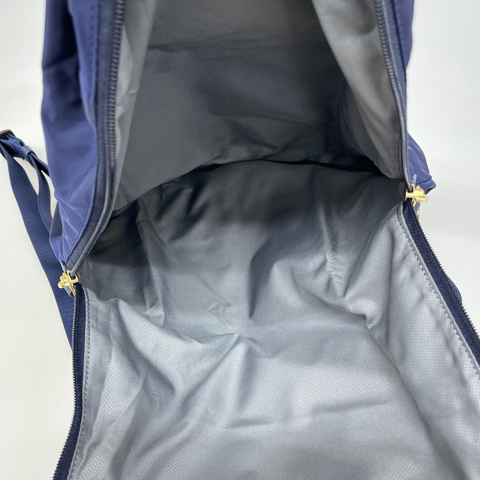 リュック・デイパック JUST IN CASE TRAVEL BACKPACK ネイビー