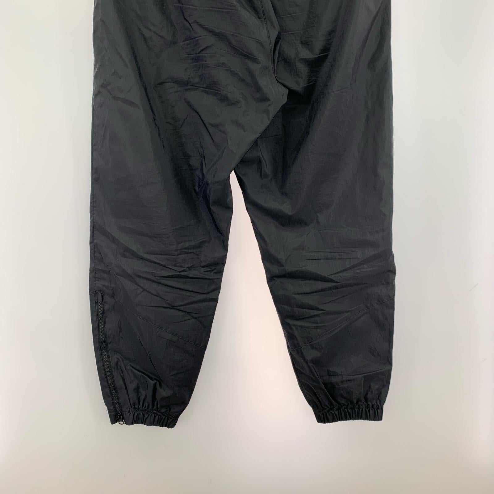 パンツ ウィンドランナーウーブンパンツ BLK L L ブラック