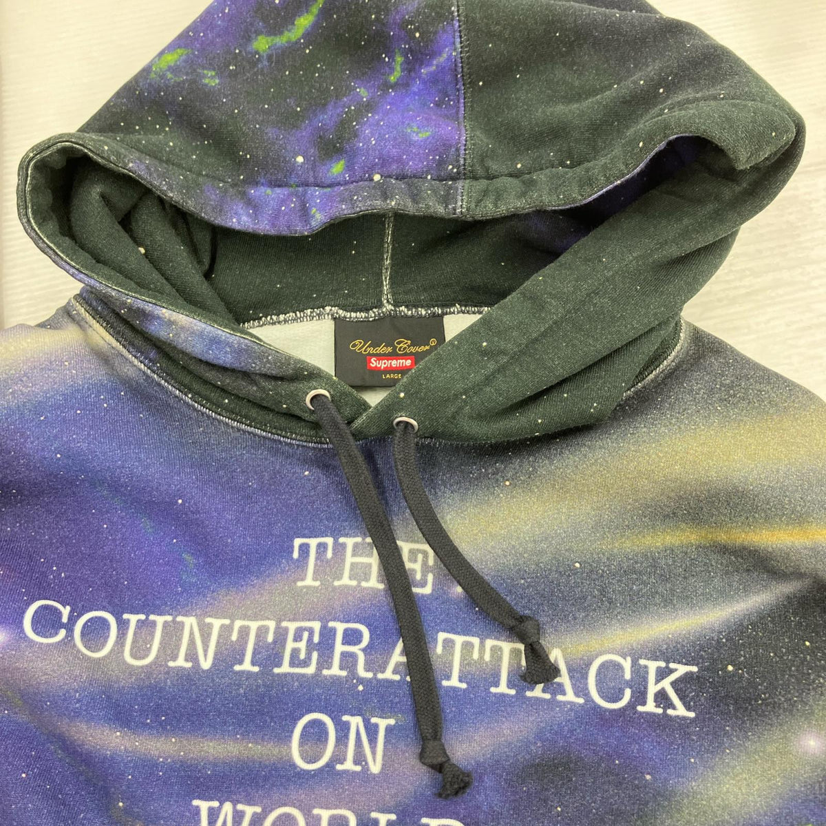パーカー ×UNDERCOVER Public Enemy 総柄 (L) L