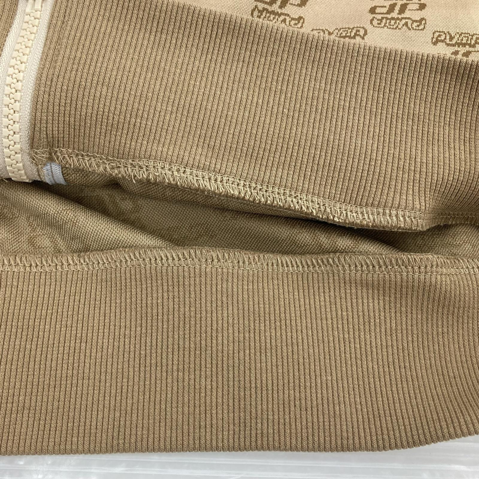 ジャケット PUMA CORE HERITAGE ｼﾞｬｶﾞｰﾄﾞ ｾｯﾄｱｯﾌﾟ L ベージュ