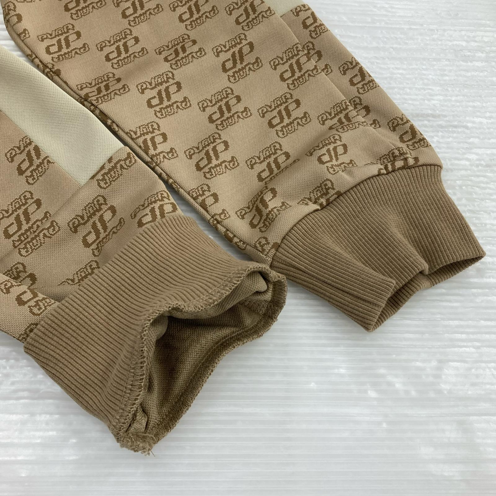 ジャケット PUMA CORE HERITAGE ｼﾞｬｶﾞｰﾄﾞ ｾｯﾄｱｯﾌﾟ L ベージュ