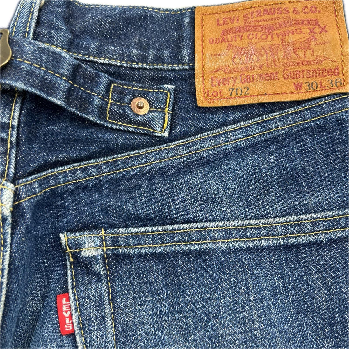 デニムパンツ levis 702 ﾎﾞﾀﾝ裏J22 30 ネイビー