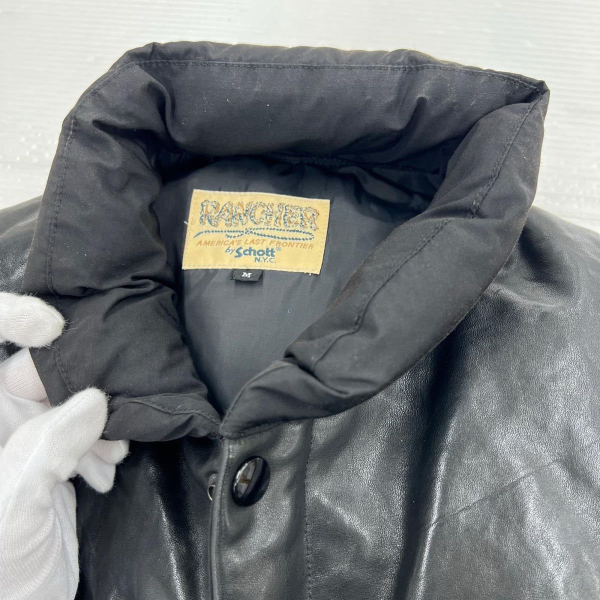 ダウンベスト LEATHER COMB. VEST/ｻｲｽﾞM M ブラック