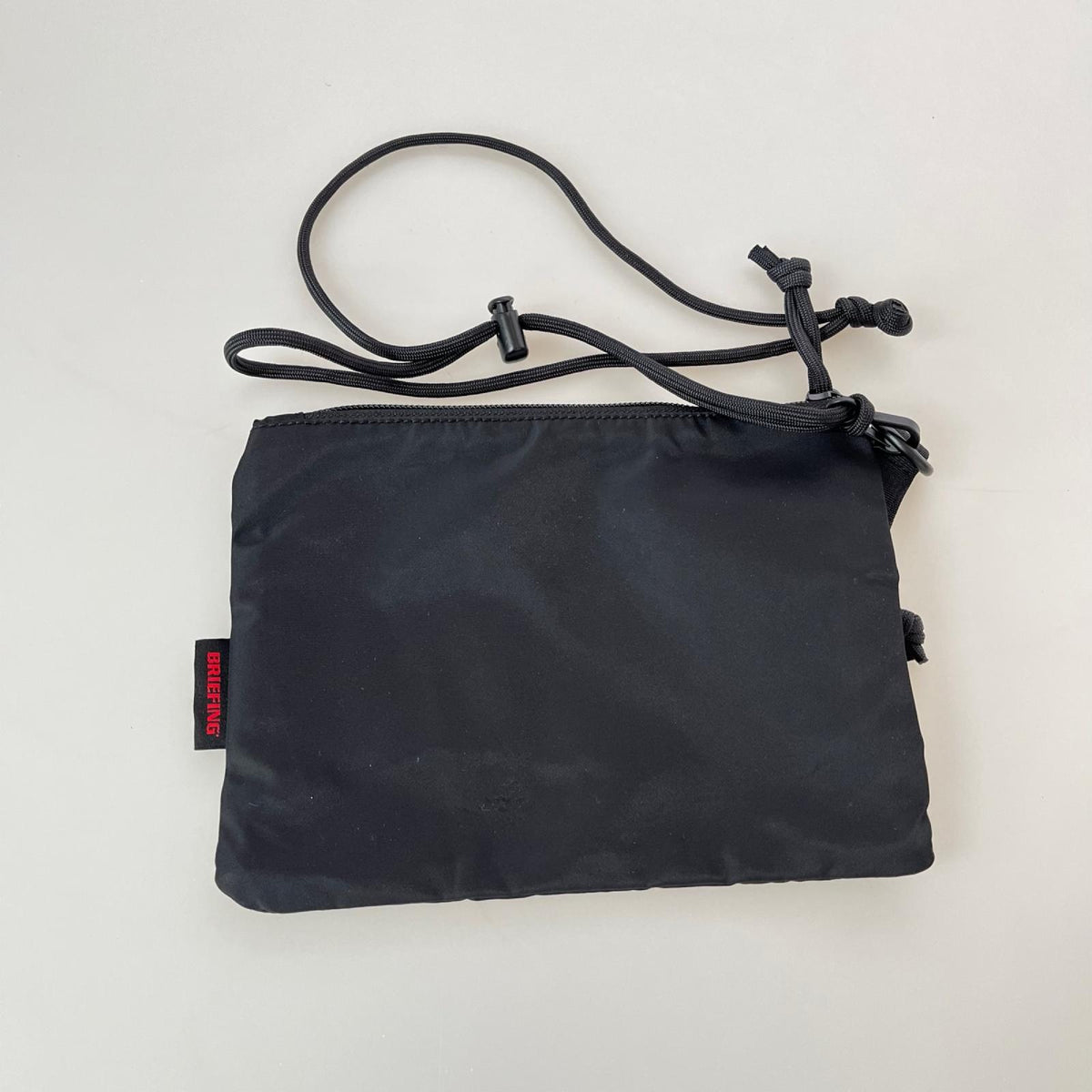 その他バッグ FLAT POUCH ﾌﾗｯﾄﾎﾟｰﾁ ﾈｯｸﾎﾟｰﾁ 黒 ブラック