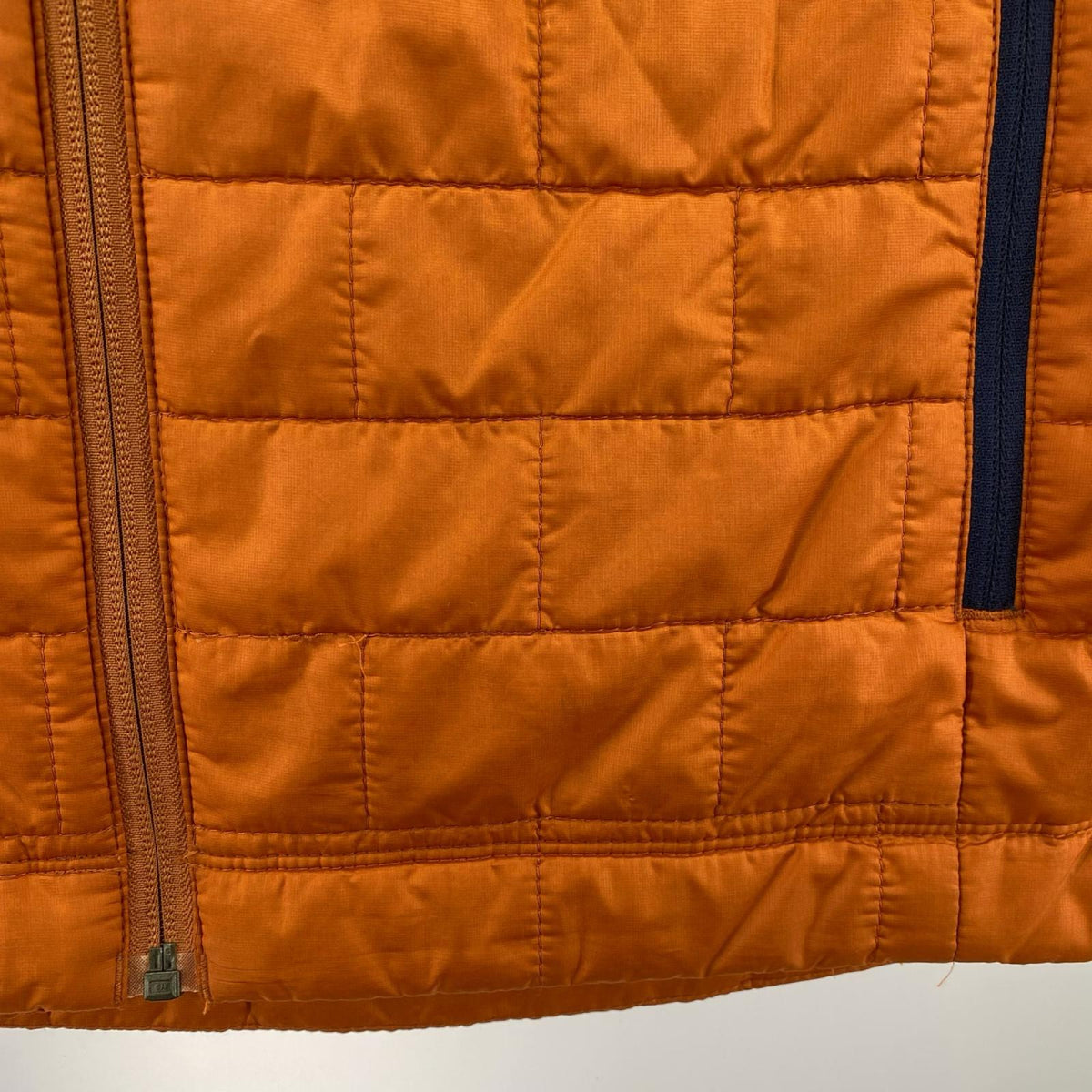 長袖シャツ Nano Puff Vest S オレンジ