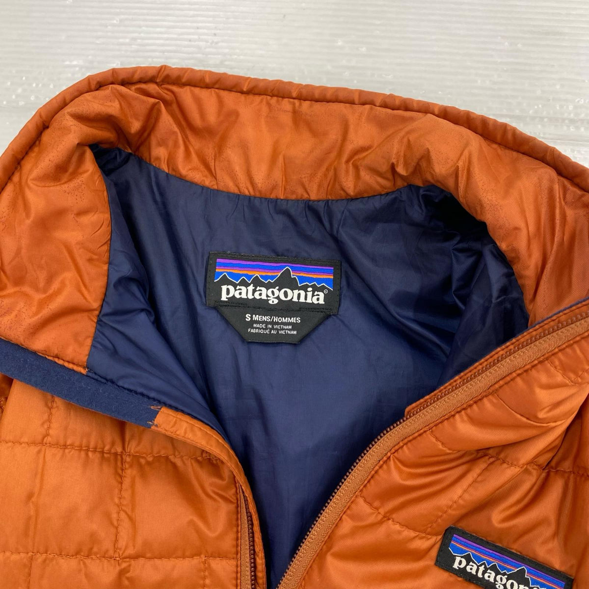 長袖シャツ Nano Puff Vest S オレンジ