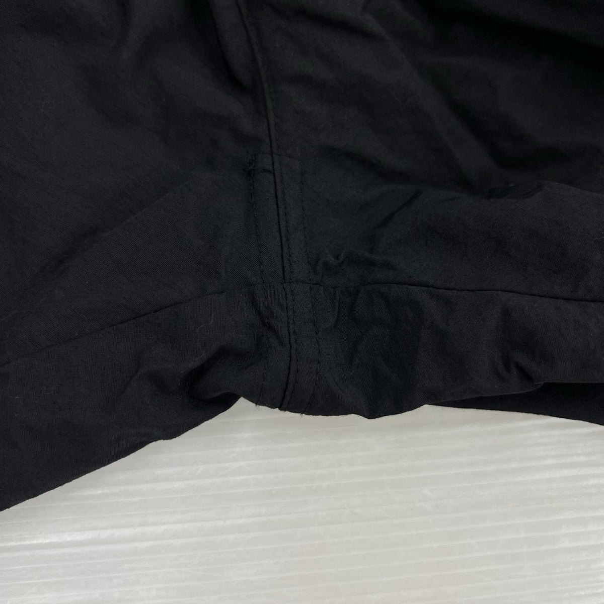 パンツ EARTH LOGO ﾅｲﾛﾝﾊﾟﾝﾂ BLK L ブラック