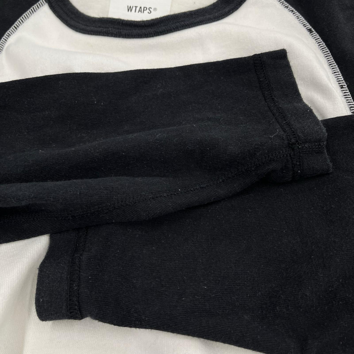 長袖Ｔシャツ WTAPS IAN / LS COTTON ﾗｸﾞﾗﾝｶｯﾄｿｰ 03 ﾎﾜｲﾄ×ﾌﾞﾗｯｸ