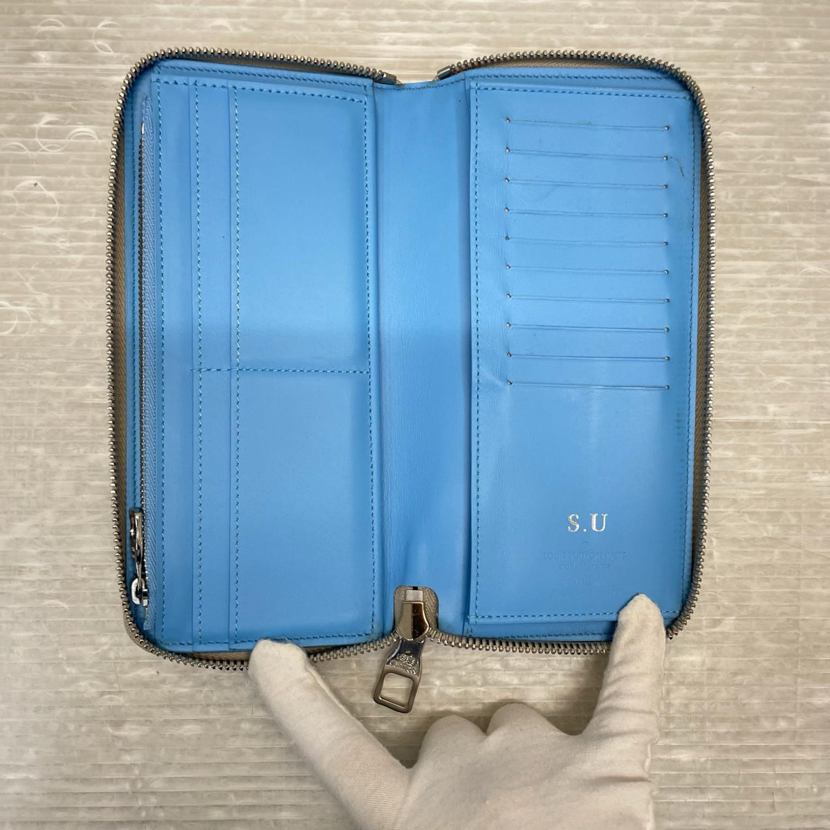 LOUIS VUITTON トリヨン・クライミング ジッピーウォレット ヴェルティカル M81573