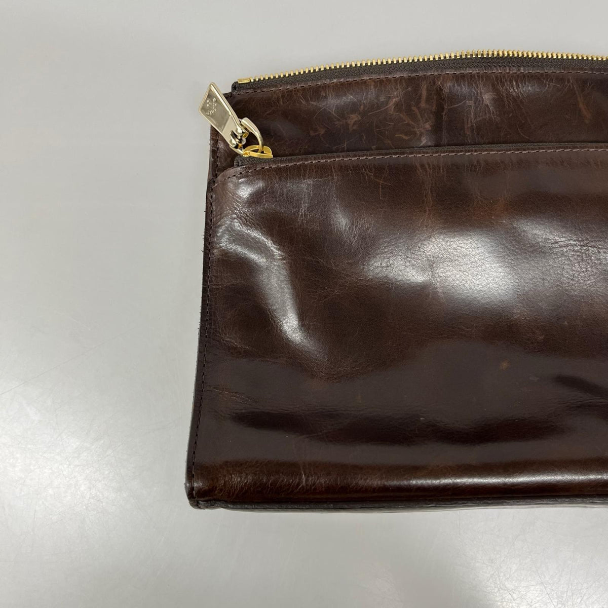 その他バッグ レザークラッチ ブラウン