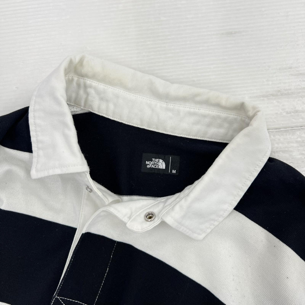 ポロシャツ ﾎﾞｰﾀﾞｰ SS RUGBY POLO 白/黒 M ブラック