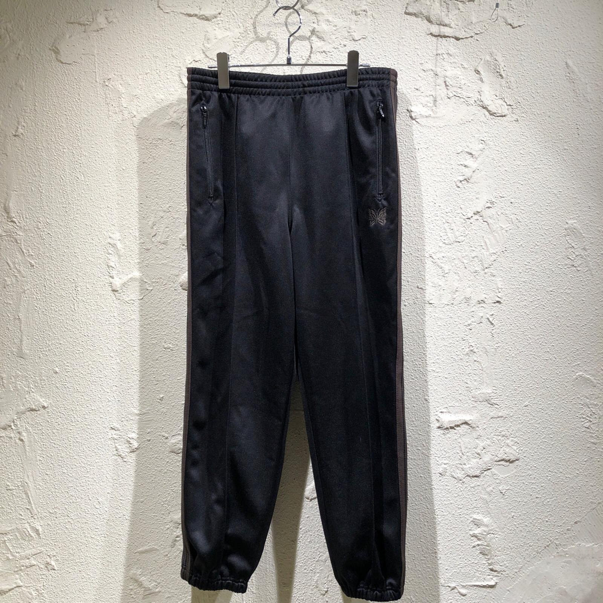 パンツ Zipped Track Pant M ダークブラウン