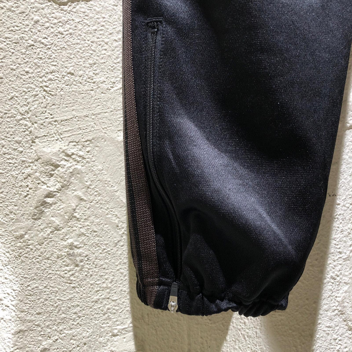 パンツ Zipped Track Pant M ダークブラウン