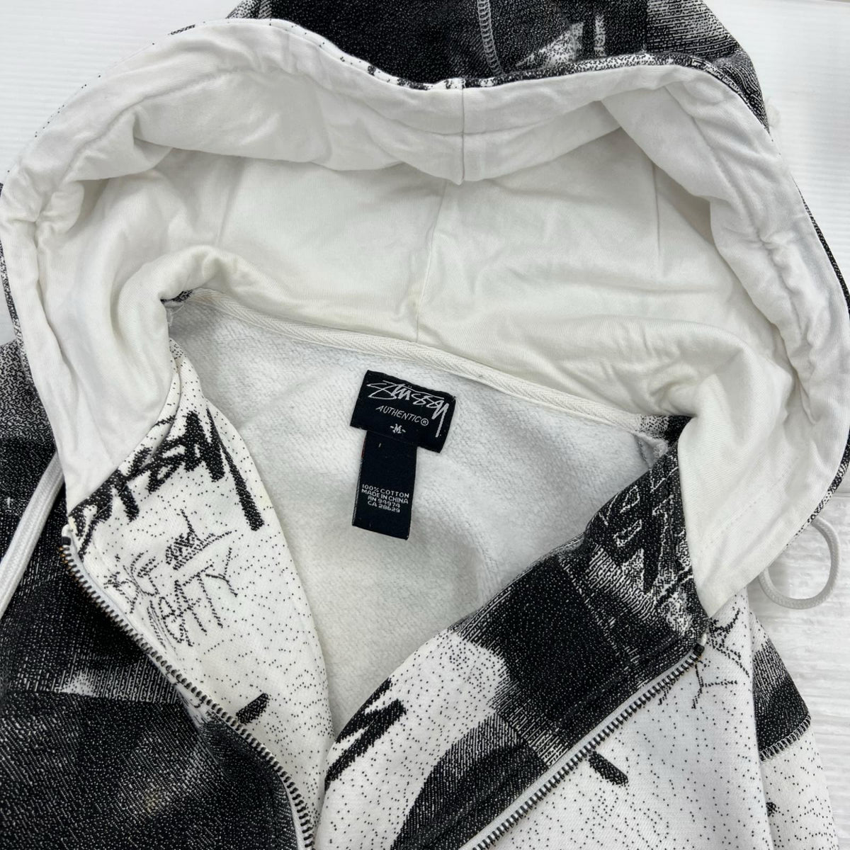 パーカー STUSSY 総柄ｺﾗｰｼﾞｭｼﾞｯﾌﾟﾊﾟｰｶｰ M