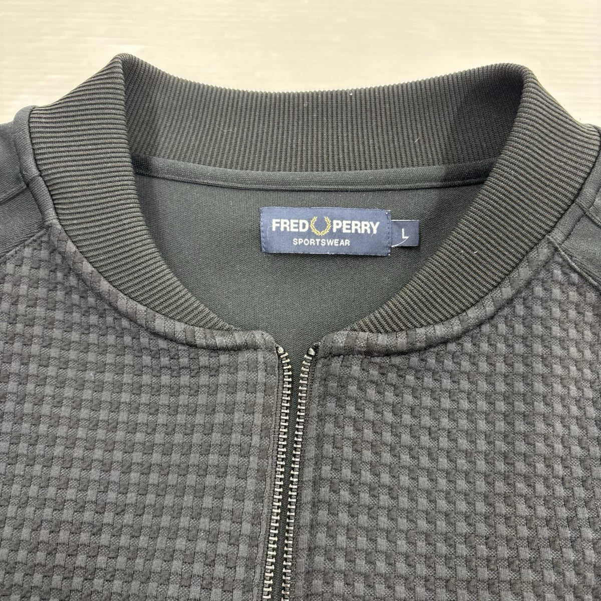 ジャケット ﾄﾗｯｸｼﾞｬｹｯﾄ BLK L L ブラック