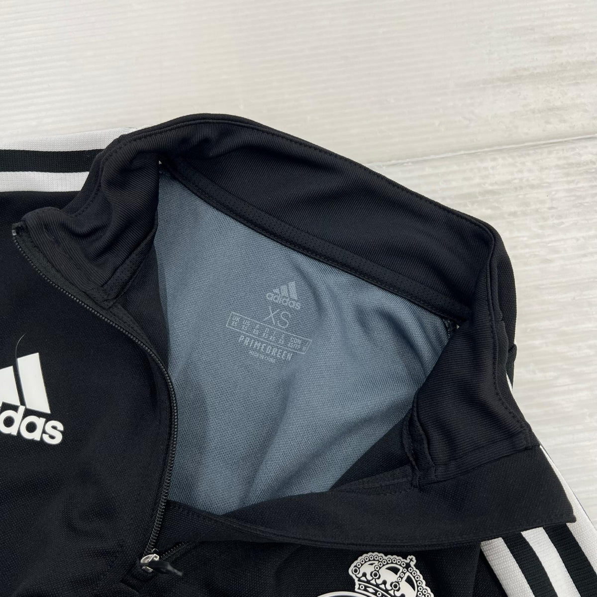 長袖Ｔシャツ adidas ﾚｱﾙﾏﾄﾞﾘｰﾄﾞ HUMAN RACE ﾄﾚｰﾆﾝｸﾞﾄｯﾌﾟ ブラック