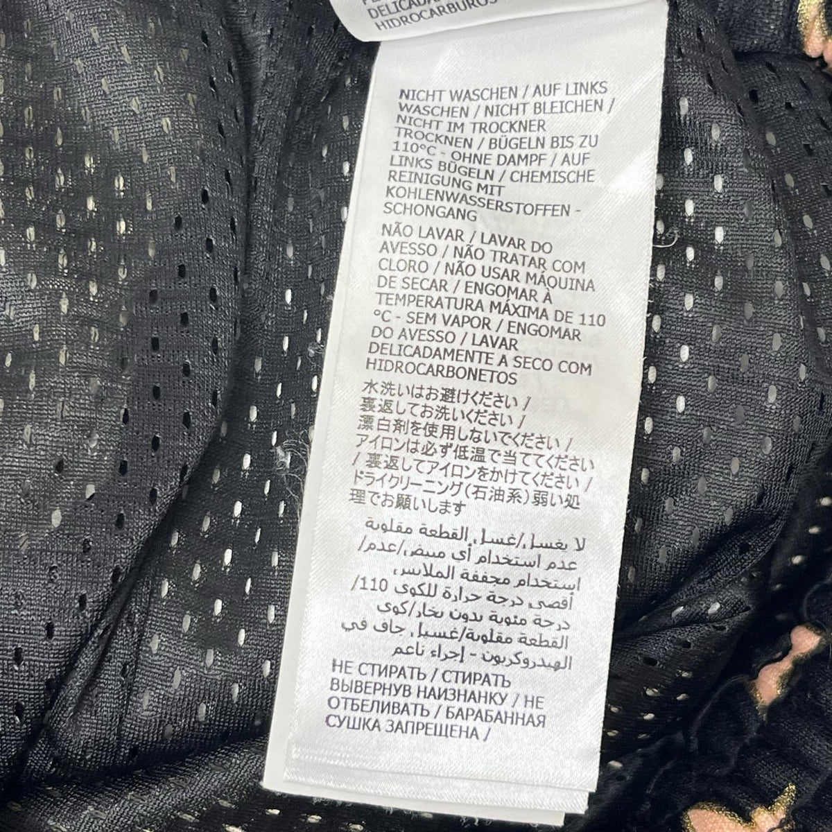 GUCCI/Technical jersey shorts with stars M 705299