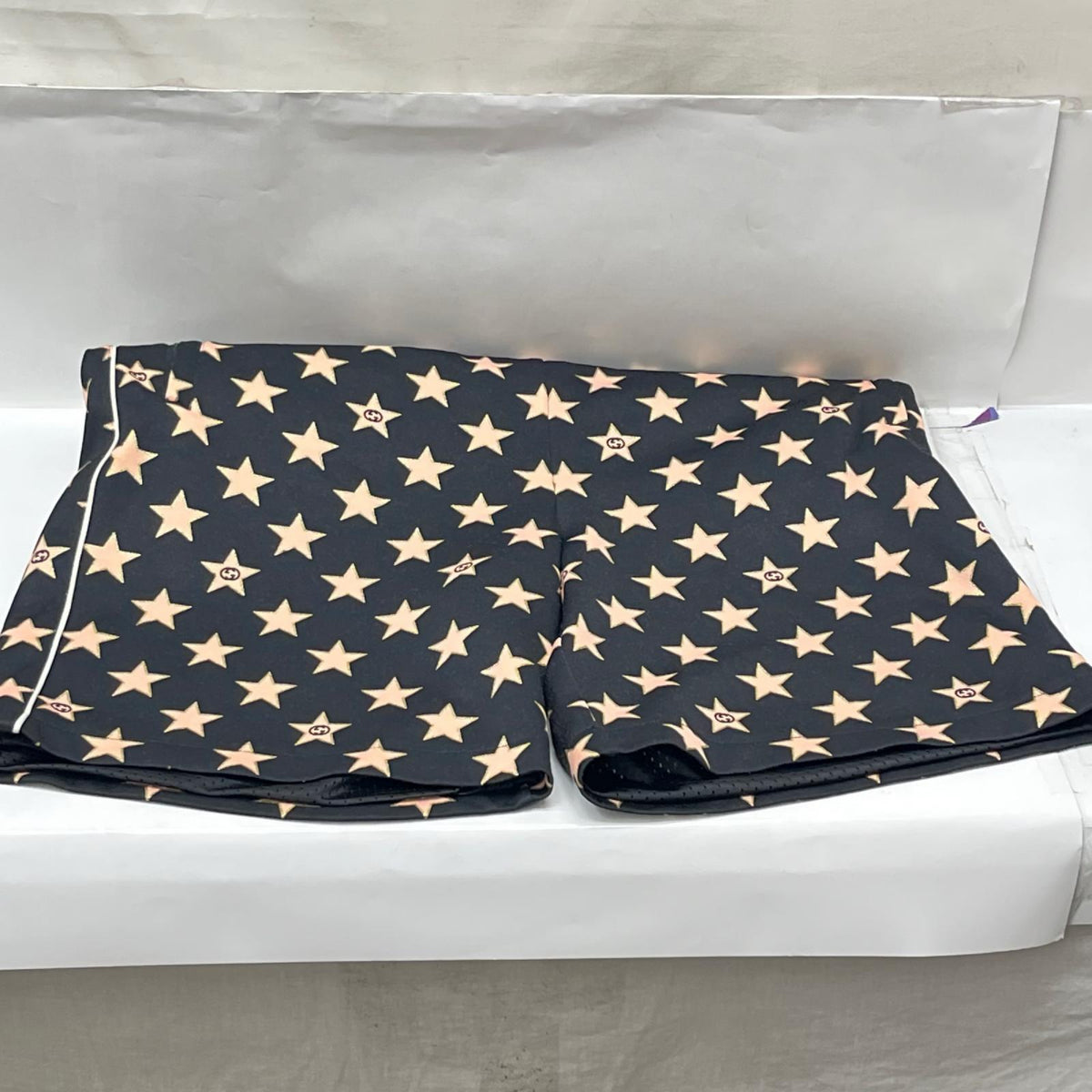 GUCCI/Technical jersey shorts with stars M 705299