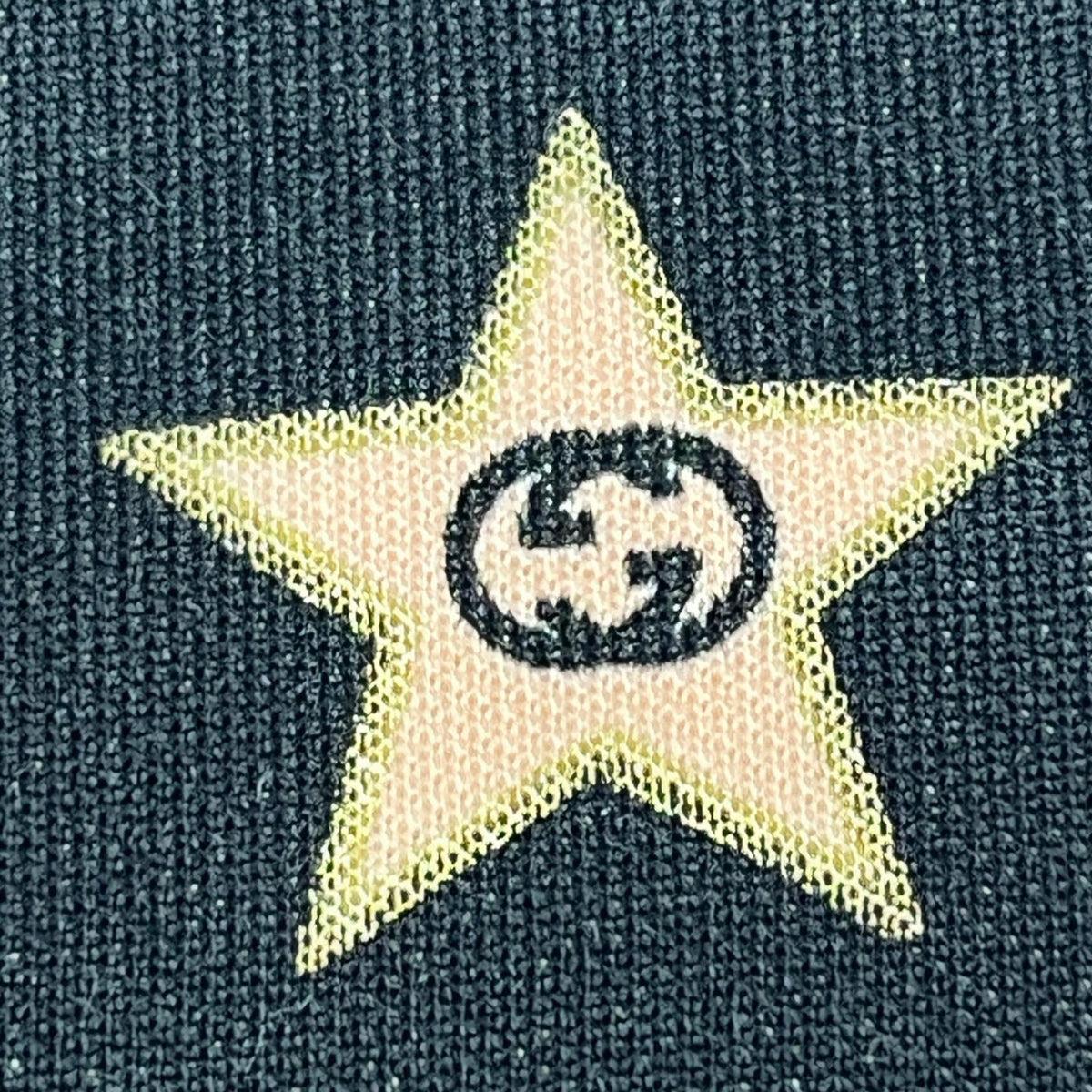 GUCCI/Technical jersey shorts with stars M 705299