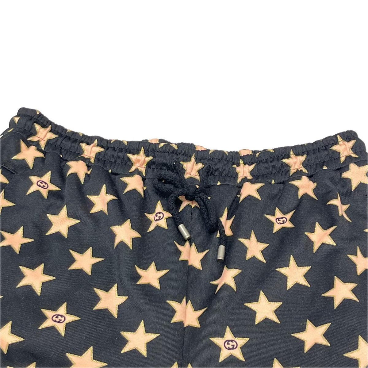 GUCCI/Technical jersey shorts with stars M 705299