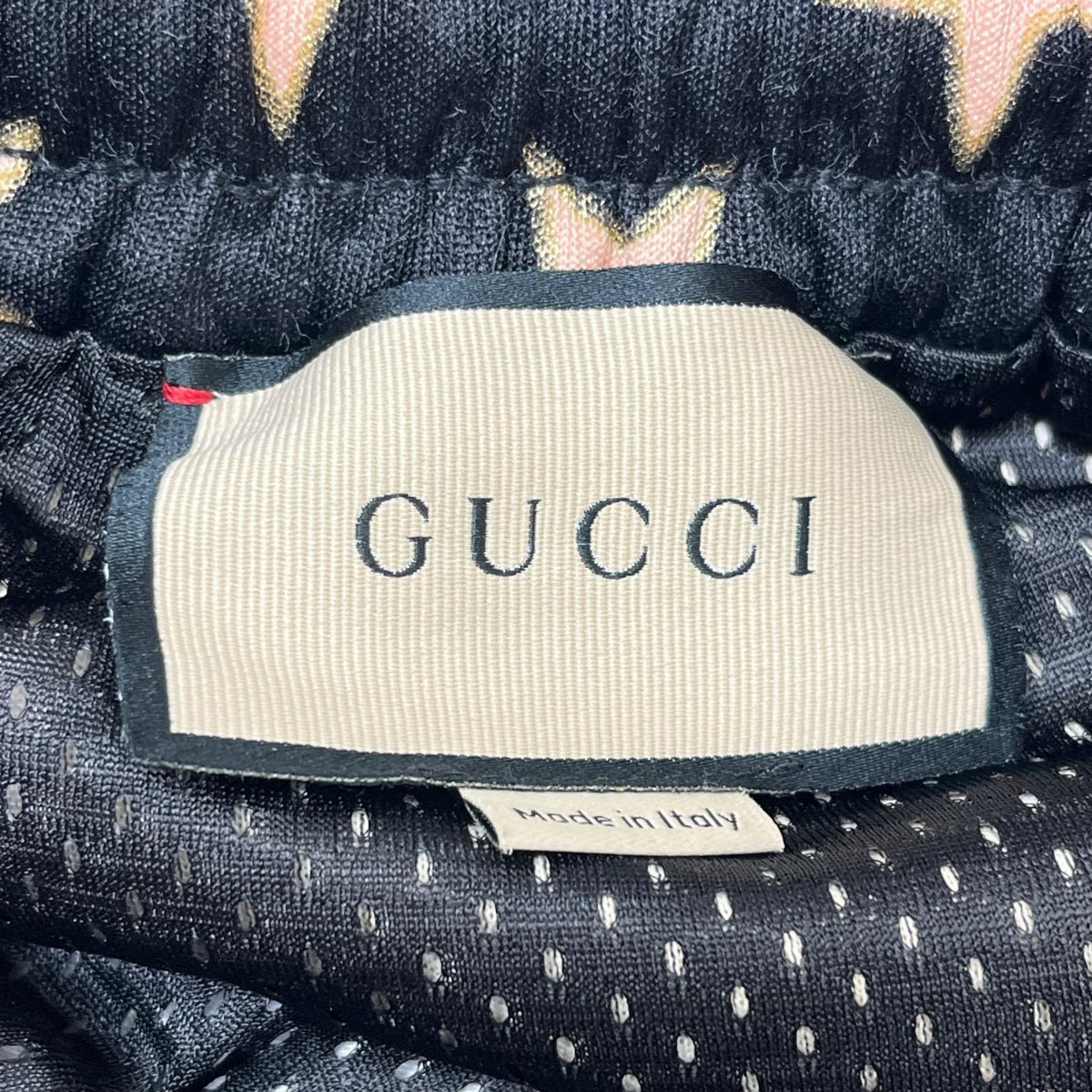 GUCCI/Technical jersey shorts with stars M 705299