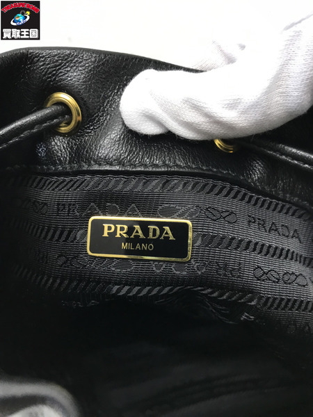 PRADA ショルダーバッグ 2WAY 型押しロゴ レザー 巾着 黒  1BH038
